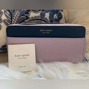 Brand new Kate Spade large Cameron Continental zip around wallet.